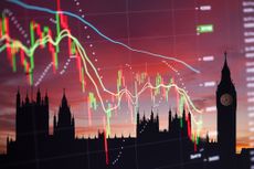 UK economy - houses of parliament on a background of an economic chart