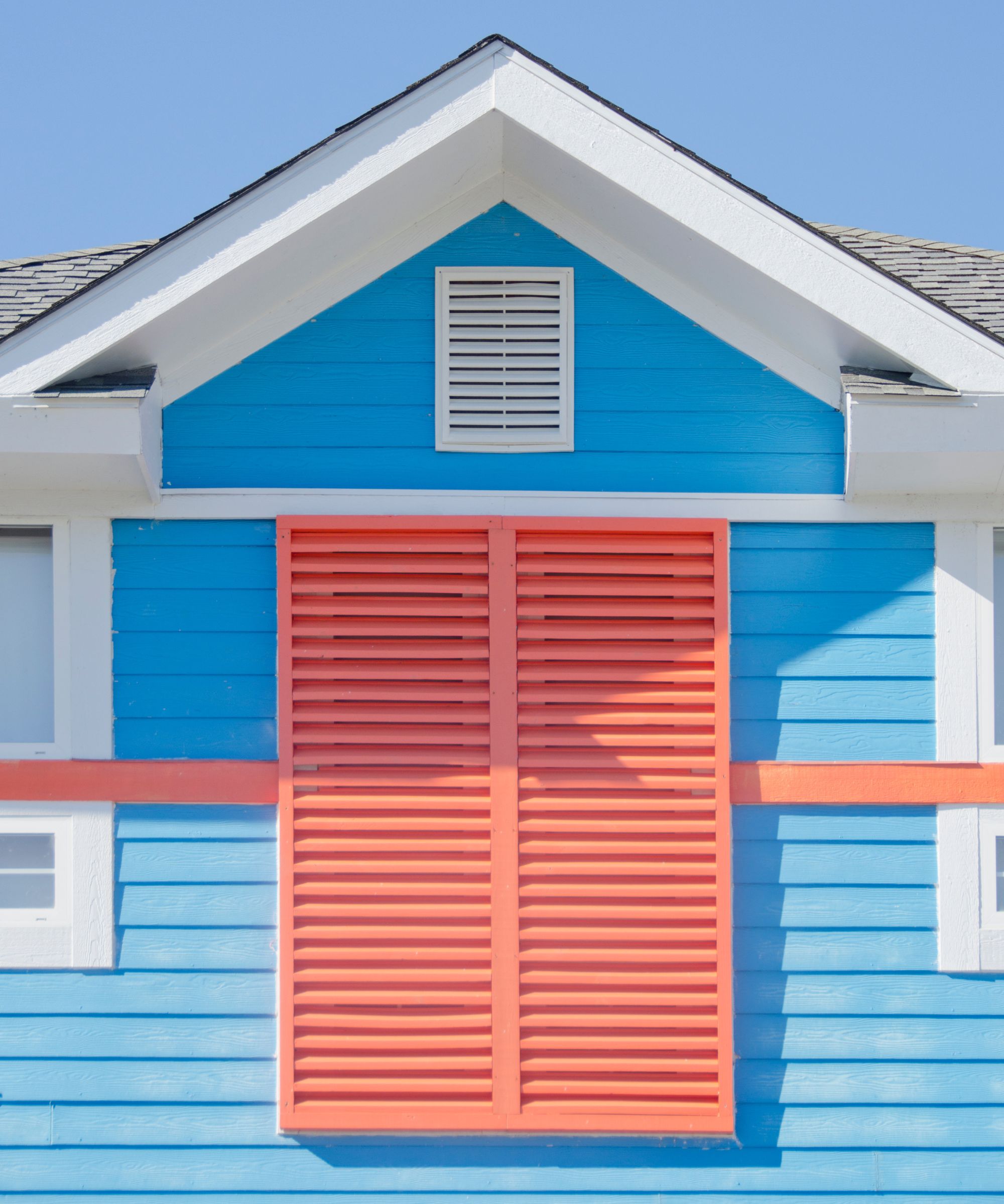 A new building constructed along the coast of North Carolina has fashionable window shutters that also protect against damage from hurricanes and high winds.