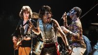 Mick Taylor (L) and Mick Jagger (C) of the Rolling Stones perform with Stevie Wonder (R) at Madison Square Garden. The concert was the final performance of the group's 30-city, 3-month tour of the United States and Canada.