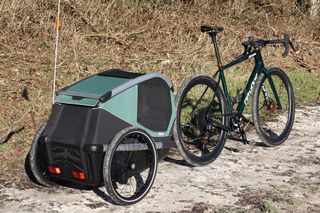 Bexey trailer hitched up and ready to ride, photographed three-quarters on from the rear.