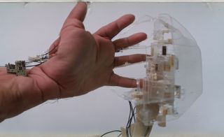 hand with wires