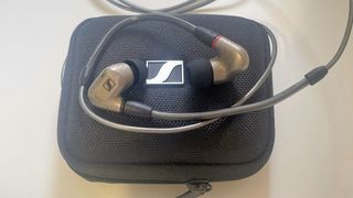 Sennheiser IE600 placed on top of carry case