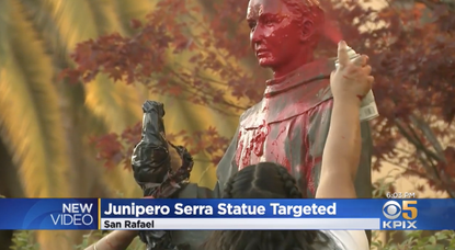 The vandalized statue. 