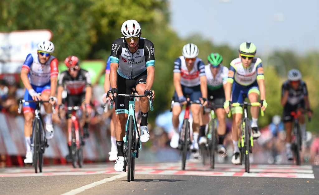 VILLANUEVA DE LA SERENA SPAIN AUGUST 27 Michael Matthews of Australia and Team BikeExchange crosses the finishing line during the 76th Tour of Spain 2021 Stage 13 a 2037km stage from Belmez to Villanueva de la Serena lavuelta LaVuelta21 on August 27 2021 in Villanueva de la Serena Spain Photo by Stuart FranklinGetty Images