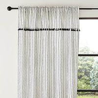Lana Monochrome Tassel Voile Panel curtains | £18 - £24 at Dunelm