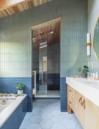 bathroom with field tiles in Blue Galena and New Lagoon from Ann Sacks’ MADE collection at West One Bathroom