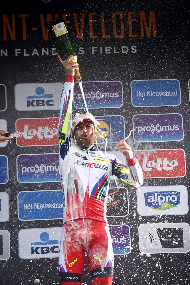 Luca Paolini (Katusha) showers himself with champagne after winning Gent-Wevelgem