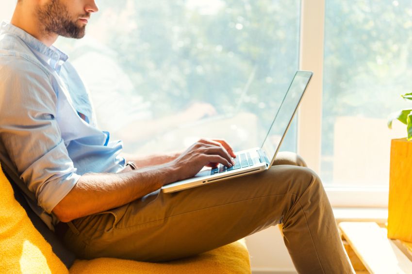 A man on his laptop.