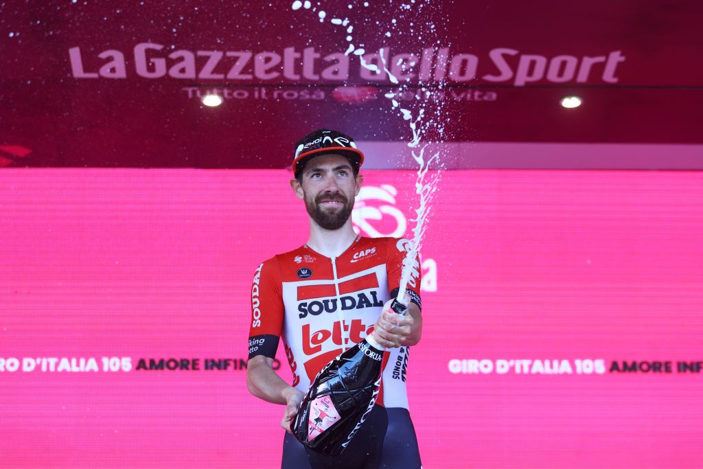 NAPOLI ITALY MAY 14 Thomas De Gendt of Belgium and Team Lotto Soudal celebrates winning the stage on the podium ceremony after the 105th Giro dItalia 2022 Stage 8 a 153km stage from Napoli to Napoli Giro WorldTour on May 14 2022 in Napoli Italy Photo by Michael SteeleGetty Images