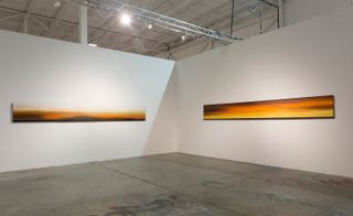 Two panoramic pieces of art with yellow/orange gradients.
