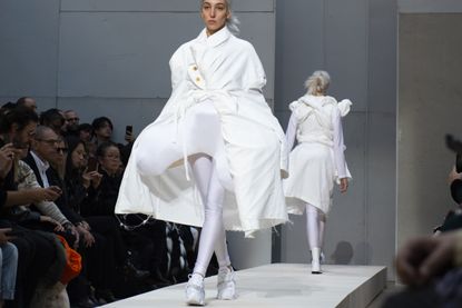 models wearing white coloured outfit