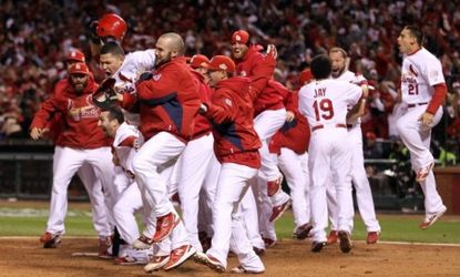 The St. Louis Cardinals celebrate their dramatic win over the Rangers in game six of the World Series.