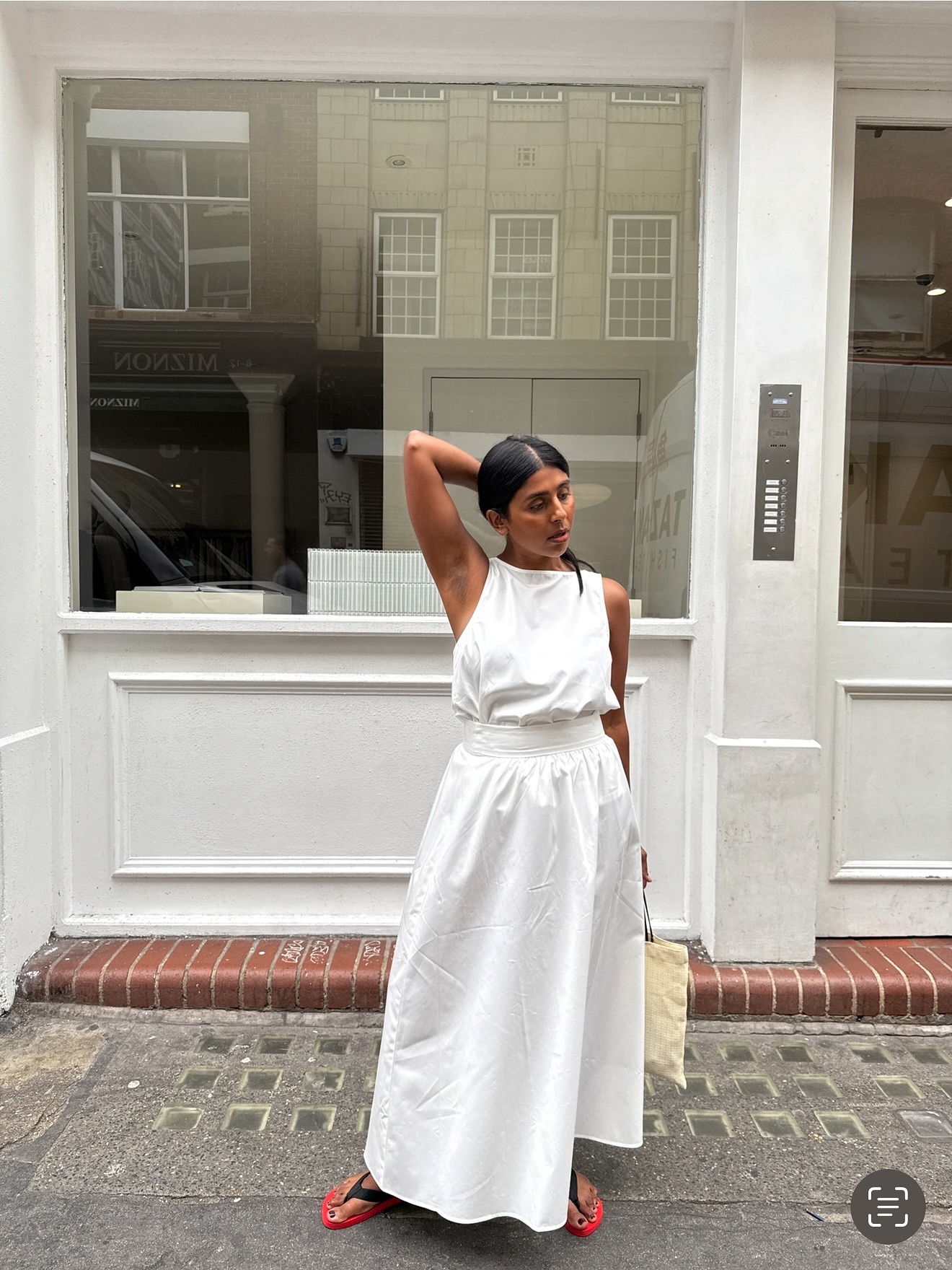 Monikh wearing linen dress