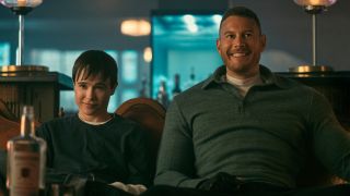 Viktor and Luthor smiling on couch in The Umbrella Academy