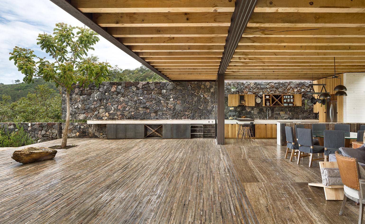 The dramatic oversailing roof structure pays homage to the projecting timber eaves of vernacular Mexican architecture