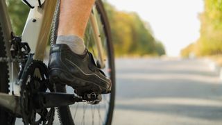 Cycling vs walking: image shows cyclist and cycling shoes