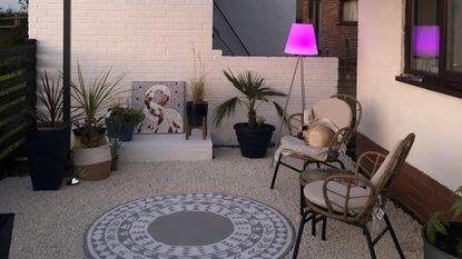 garden makeover with outdoor furniture and rug