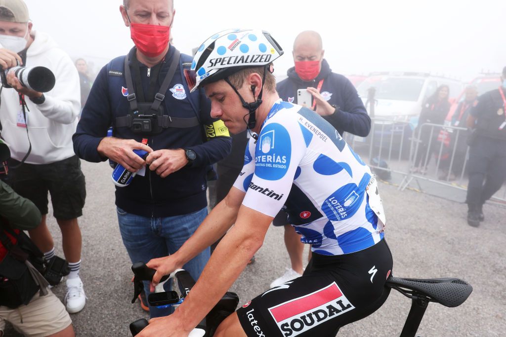 ALTU DE LANGLIRU SPAIN SEPTEMBER 13 Remco Evenepoel of Belgium and Team Soudal Quick Step Polka Dot Mountain Jersey reacts after the 78th Tour of Spain 2023 Stage 17 a 1244km stage from Ribadesella Ribeseya to Altu de LAngliru 1555m UCIWT on September 13 2023 in Altu de LAngliru Spain Photo by Alexander HassensteinGetty Images