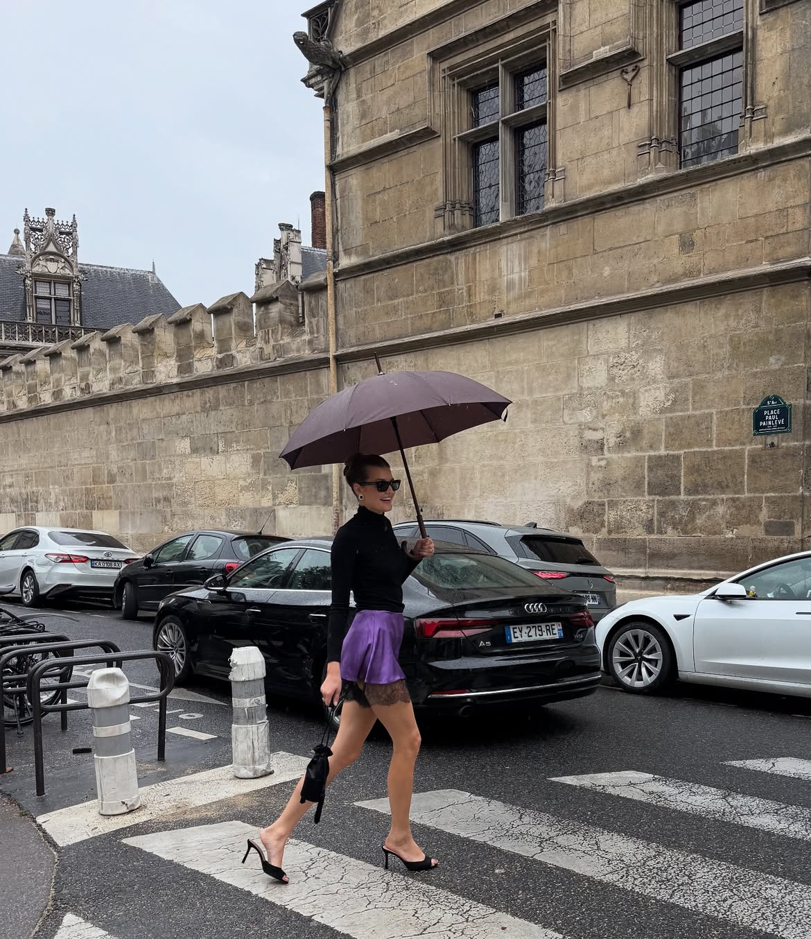 Sara Walker in purple shorts