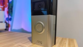Looking at the Ring Video Doorbell 4 side on, while its stood on a table