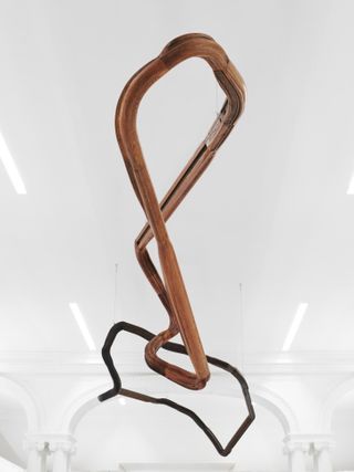 Nika Neelova Lemniscate XI and Lemniscate XIV, sculptures made from reclaimed bannister handrails which are suspended from the ceiling of Celine New Bond Street