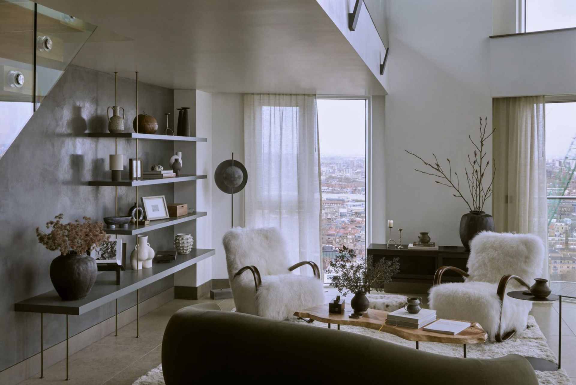 a scandi style apartment with a dark painted wall