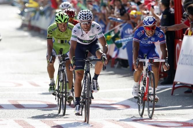 Alejandro Valverde leads him a surprising Nacer Bouhanni on stage 13 of the Vuelta a Espana.