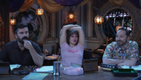 The cast of Critical Role take a moment, filled with stress.