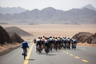 The peloton rides in Saudi Arabias northwestern city of al'Ula in the 2022 Saudi Tour