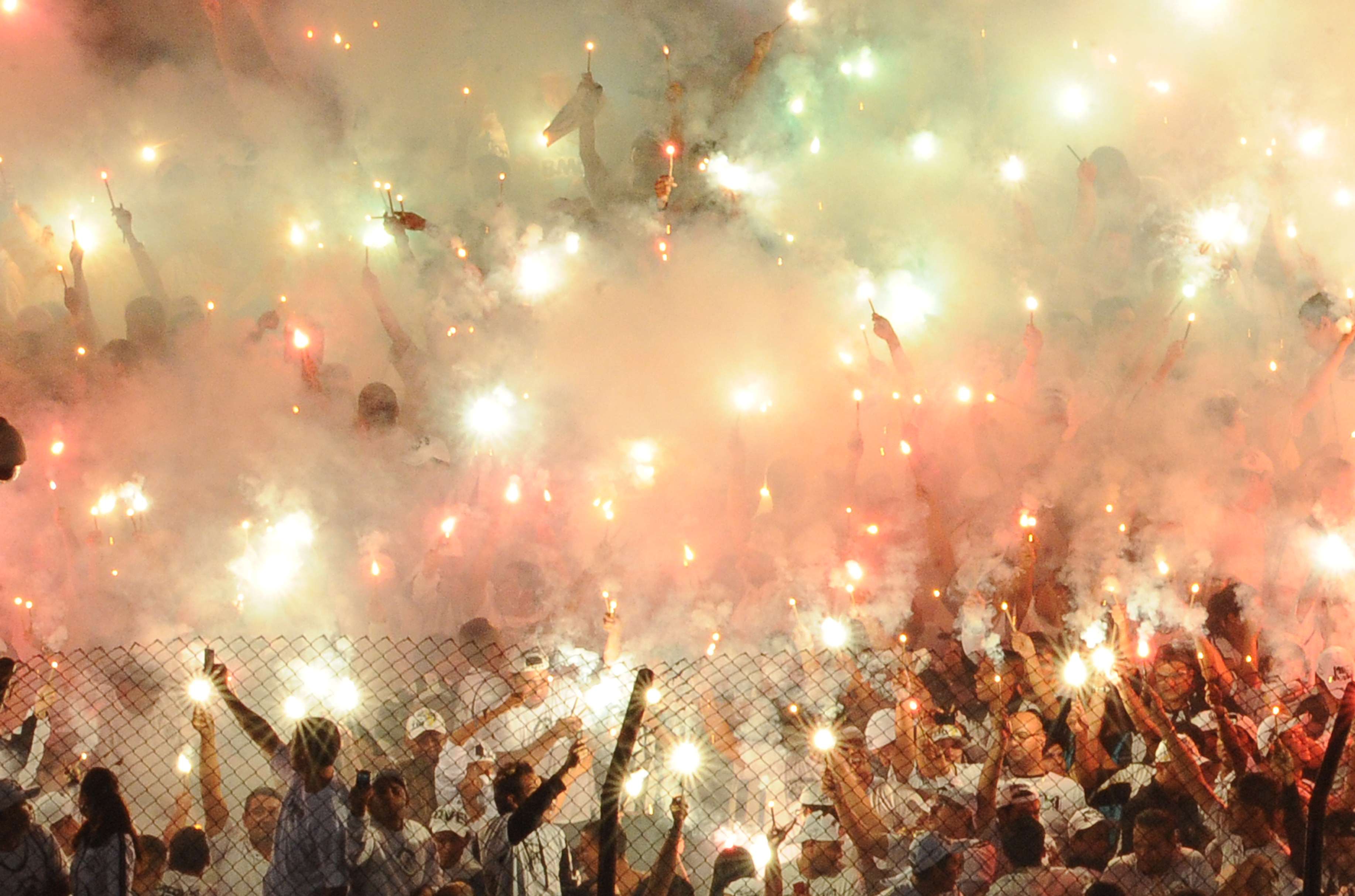 Santos fans light flares ahead of a Copa Libertadores game against Corinthians in 2012.