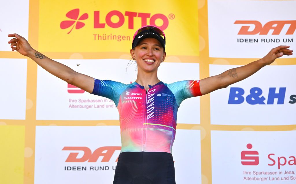 MUHLHAUSEN GERMANY JUNE 28 Katarzyna Niewiadoma of Poland and Team CanyonSRAM Racing celebrates at podium as Orange Attack Queen Jersey winner during the 36th Internationale LOTTO Thringen Ladies Tour 2024 Stage 4 a 1114km stage from Muhlhausen to Muhlhausen on June 28 2024 in Muhlhausen Germany Photo by Luc ClaessenGetty Images