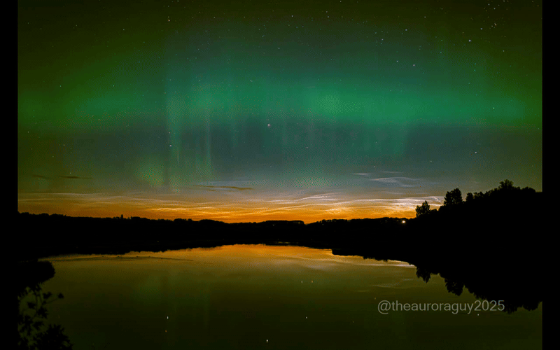 gif animation showing northern lights dancing as ribbons of green light above noctilucent clouds.