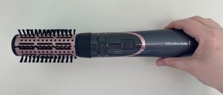 The Remington Curl and Straight Confidence Airstyler AS8606 with the rotating brush attached