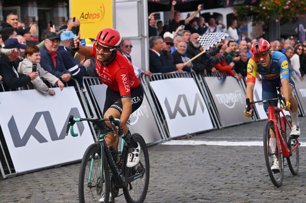 BINCHE BELGIUM OCTOBER 03 LR Luca Mozzato of Italy and Team Arkea Samsic celebrates at finish line as race winner ahead of Edward Theuns of Belgium and Team Lidl Trek during the 36th Binche Chimay Binche Mmorial Frank Vandenbroucke 2023 a 1986km one day race from Binche to Binche UCIWT on October 03 2023 in Binche Belgium Photo by Luc ClaessenGetty Images