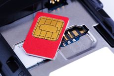 A SIM card on top of a mobile 