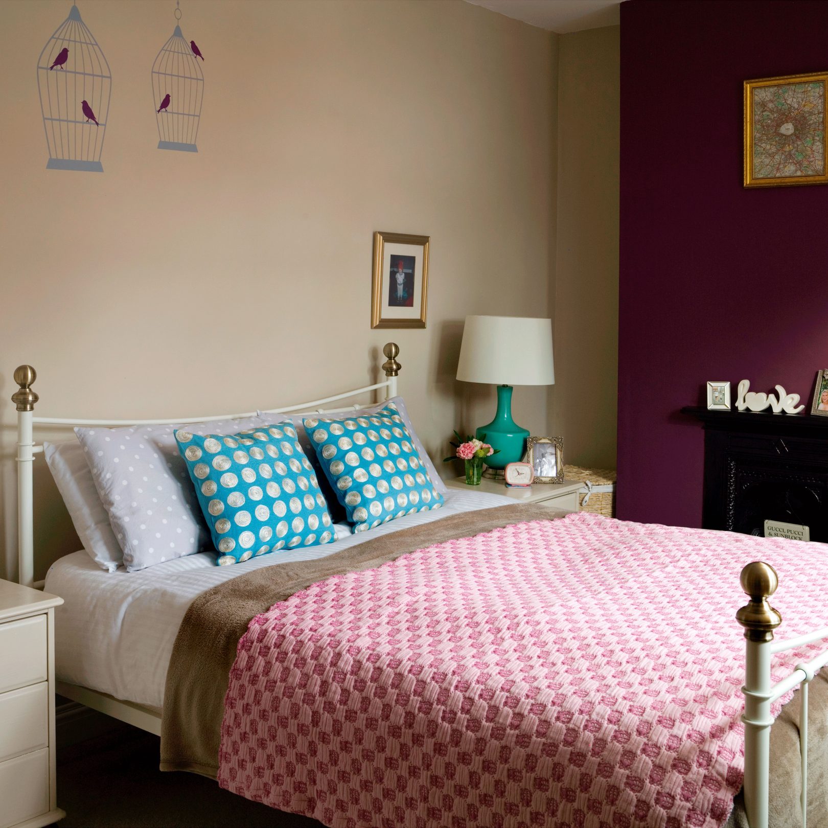 bedroom with feature wall paint cute bird wall stickers cushions and bedspread
