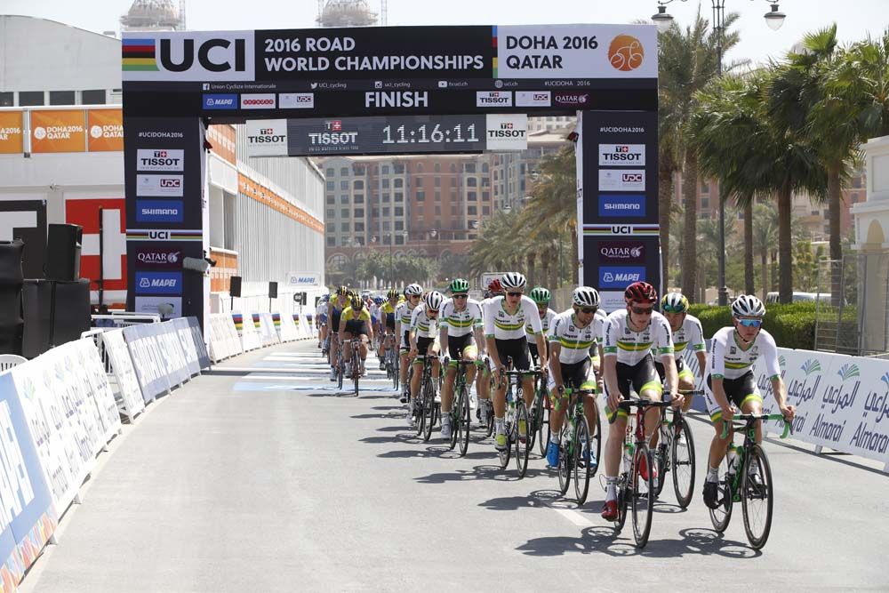 The Australia team leads the group through the finish area