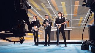 English Rock Band The Beatles, from left Paul McCartney, George Harrison, John Lennon, Ringo Starr performing on the Television Variety Series, "The Ed Sullivan Show", New York City, New York, USA, Bernard Gotfryd, February 1964