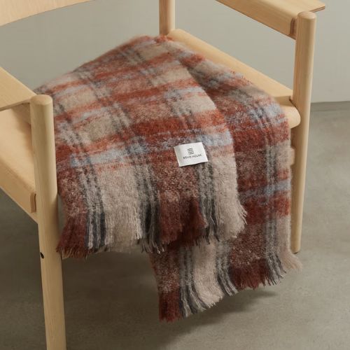 Tartan throw on chair