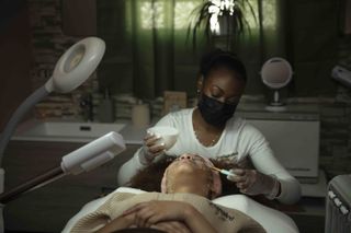 esthetician works with client - small business spotlight: melanated beauty spa
