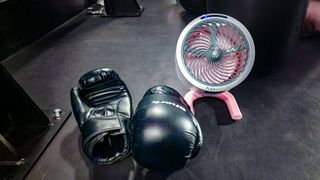 Shark FlexBreeze HydroGo in a dark gym