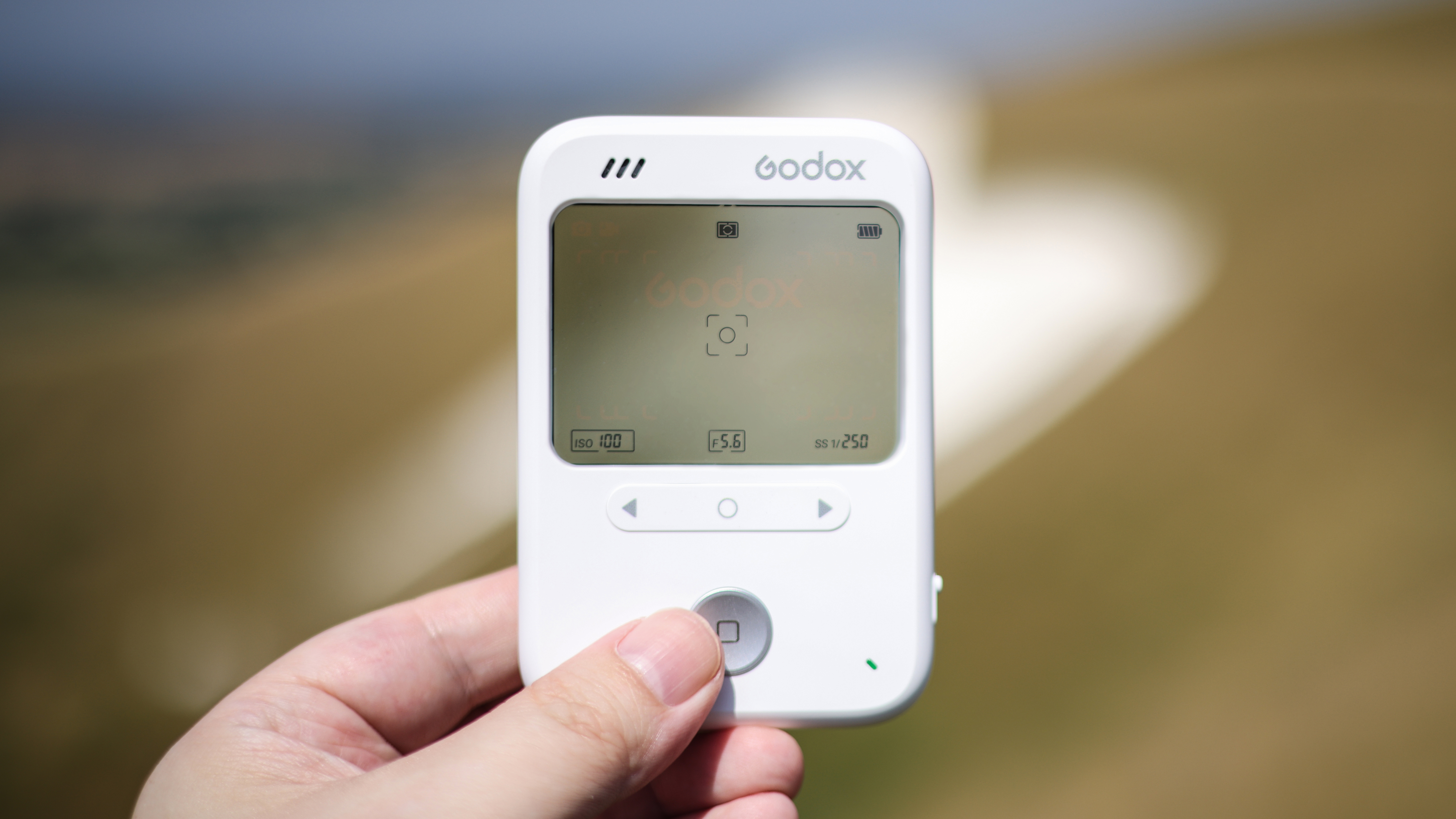 Godox C100 being held outdoors