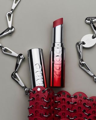 Rabanne Beauty red lipstick and Rabanne chainmail bag