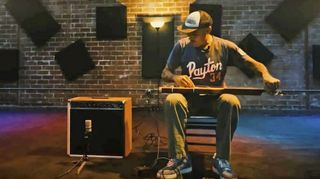 Ben Harper performs with his first Howard Dumble amp in a screen grab from a video