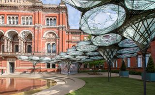 An intricate canopy of resin-coated, carbon fibre and glass thread, woven using a unique robotic technique