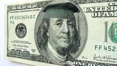 Benjamin Franklin wears a mortar board cap.