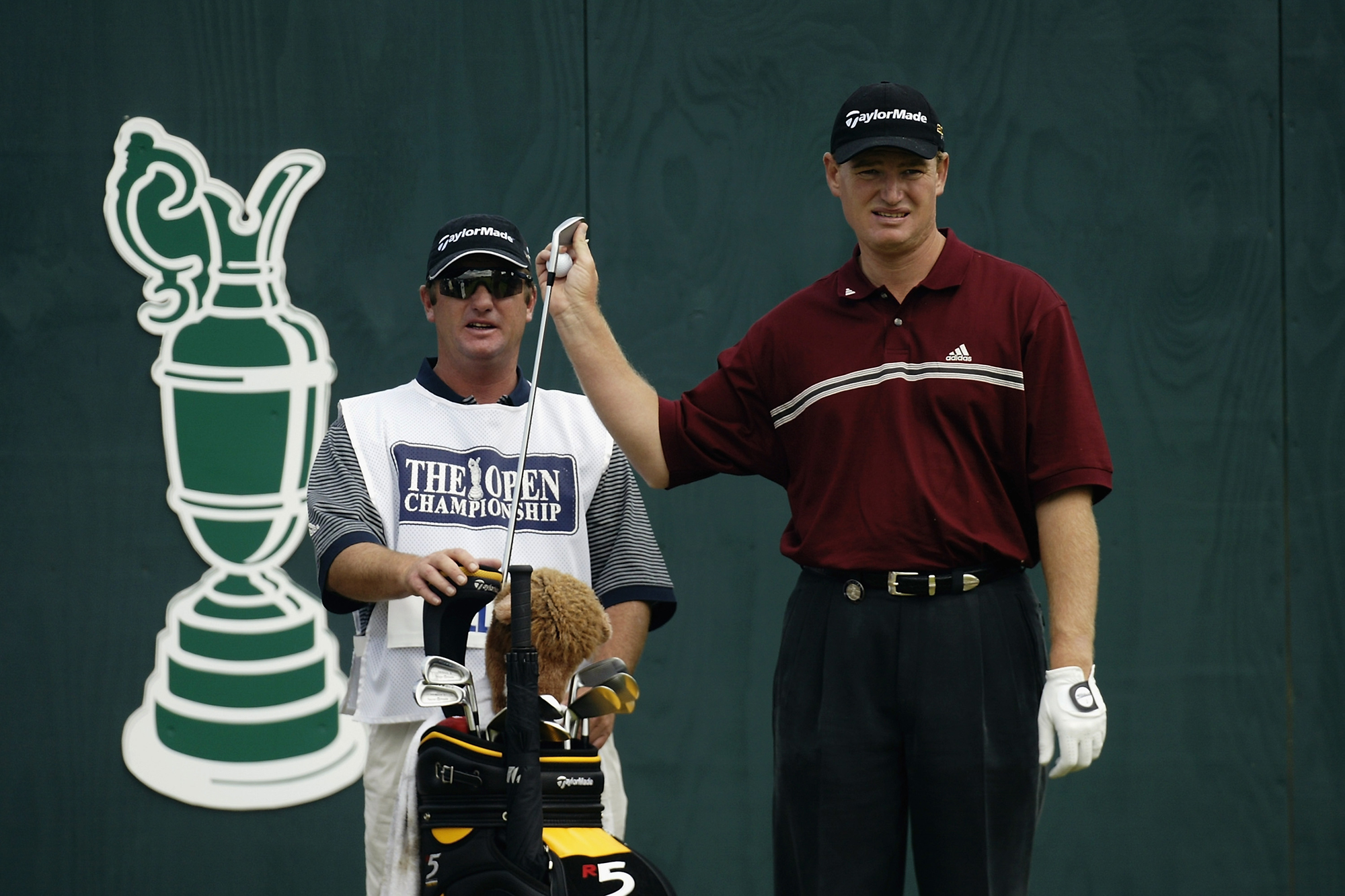 Ernie Els with his caddie and his golf bag at the 2002 Open Championship, where he would go on to win the Claret Jug