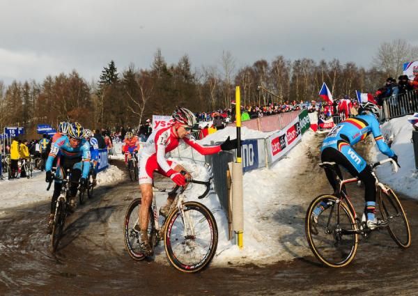 Riders grabbed the poles in corners to carry their momentum through the turns.