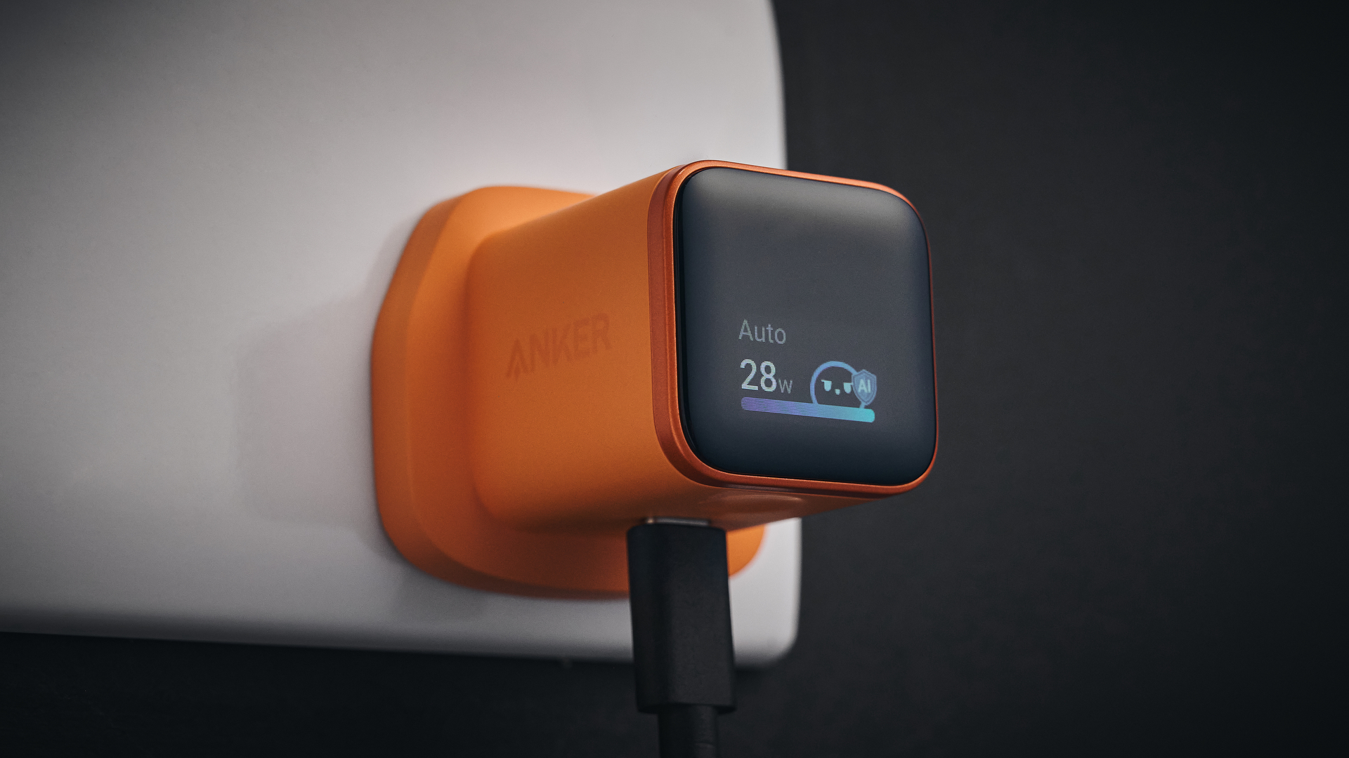 Anker Nano 45W Smart Display Charger plugged in with display on