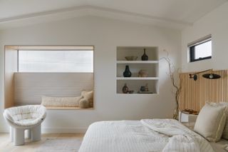 Minimalist bedroom with slat walls